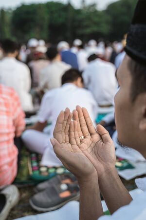 close up a man praying during Eid al-Fitrの写真素材