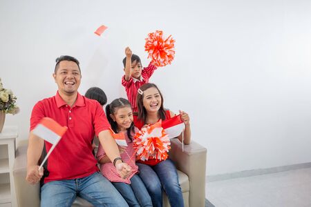 family indonesia celebrating independence dayの写真素材