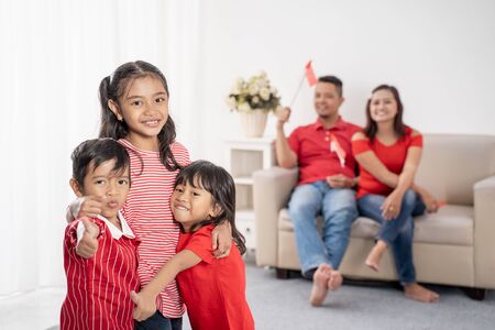 family indonesia celebrating independence dayの写真素材