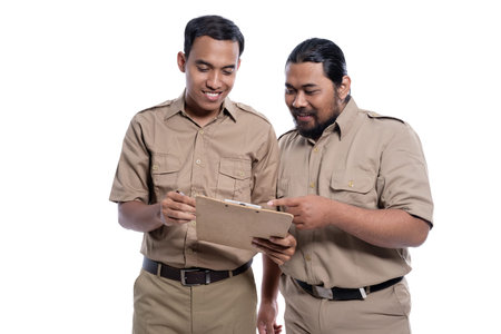 modern asian worker with brown uniform meeting togetherの写真素材
