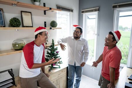 Asian worker team working in the office during christmasの写真素材