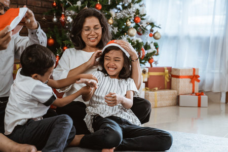 grandparents and children having fun during christmas day
