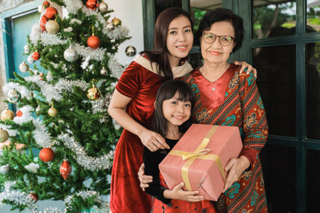 kid giving suprise gift to grandma