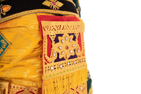 Cropped of stomach portrait of Balinese dancer wear traditional clothing