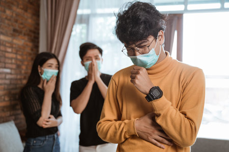 Sick man wearing medical masks coughing