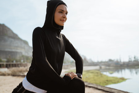 Attractive sport muslim woman with hijab exercise outdoor