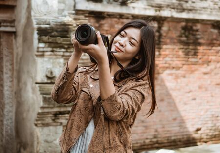 Woman travel making pictureの写真素材