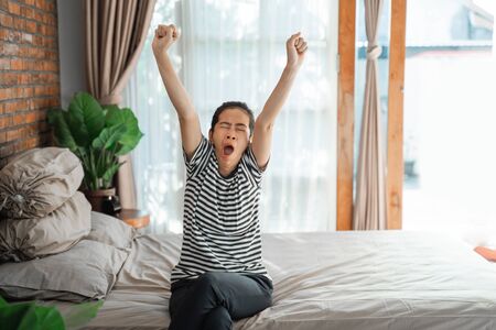 woman asian relaxing stretch her armの写真素材