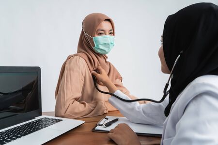 muslim patient during medical check upの写真素材