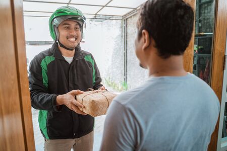 man ordering food onlineの写真素材