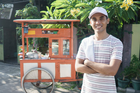 man selling bakso in the carts