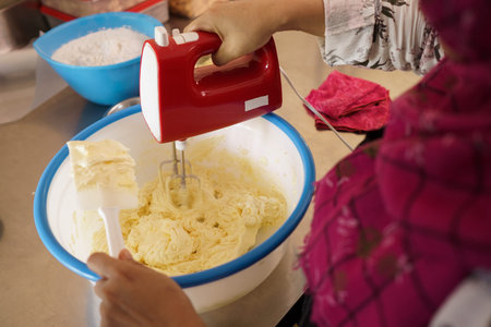 mixing dough flour to make a cake