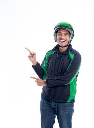 male driver pointing to white backgroundの写真素材