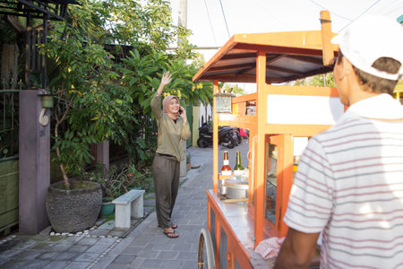 man selling bakso in the carts