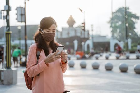 wearing face masks on new normalの写真素材