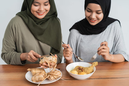 ketupat and opor ayam for ramadan celebrationの写真素材