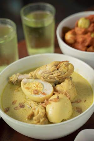 Closeup of chicken braised in coconut milk is Indonesian traditional foodの写真素材