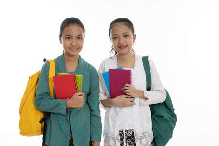 two couple student carry bag and books in casual clothesの写真素材