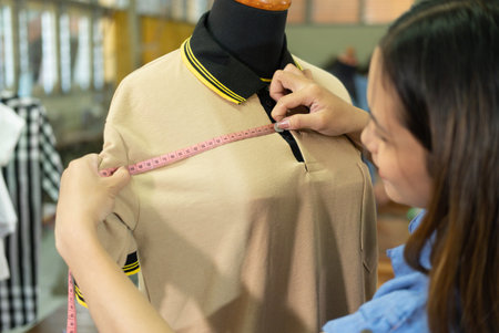 beautiful tailor women measure chest width with tape measure