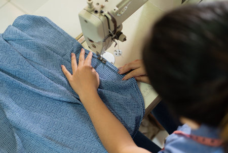 top view of women tailors working with sewing machines