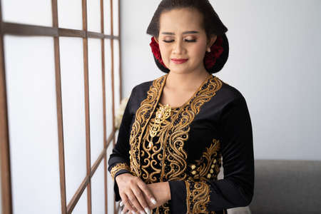 A portrait of a costume traditional Javanese womanの写真素材