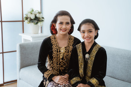Portrait of a happy mother with his daughter.