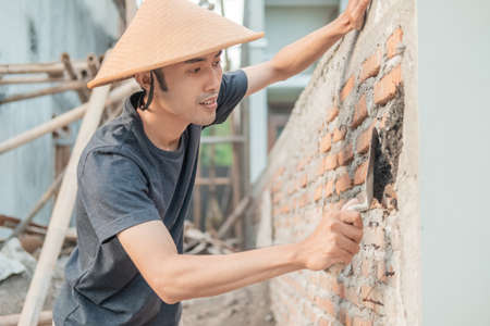 Asian construction workers close up background.の写真素材