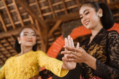 Javanese indonesian dance instructor teach a dance movement