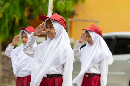 Flag honor is performed by the Indonesian elementary studentsの写真素材