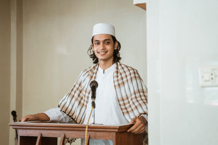 Portrait happy of muslim male preacher