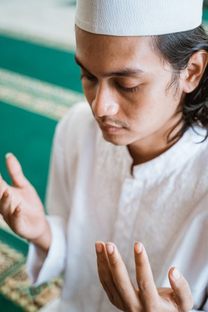 Close up man muslim doing prayerの写真素材