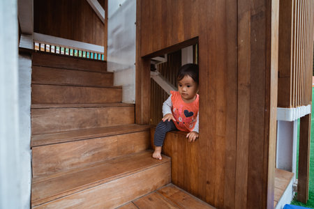 Portrait of a little girl enjoyingの写真素材