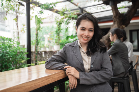Portrait cheerful of young asian business womanの写真素材