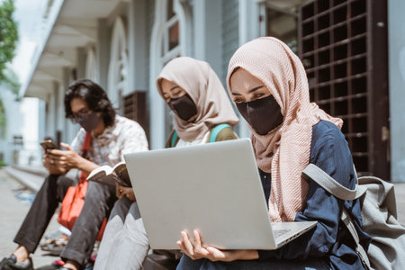 Portrait muslim wearing masks female studentsの写真素材
