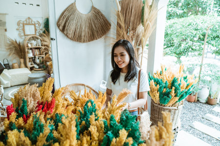 woman business owner in a craft shopの写真素材