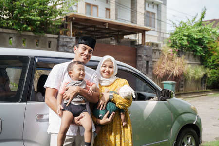 Muslim family travel by car during eid mubarak celebrationの写真素材