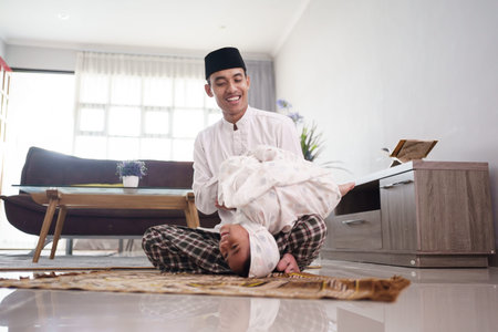 father and daughter playing after praying together