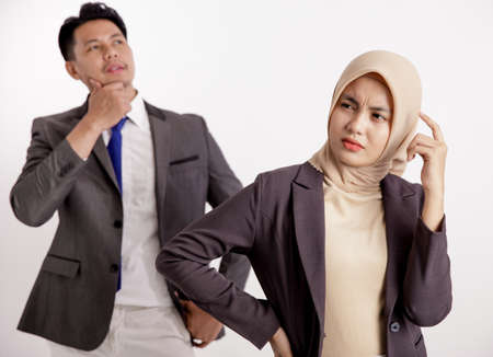 businesswoman thinking idea-expression with men looking idea too isolated white backgroundの写真素材