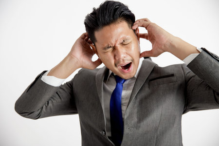 businessman hard work and stress expression office work concept isolated white backgroundの写真素材