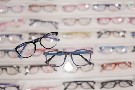 a set of glasses neatly arranged in the glasses window at an eye clinic