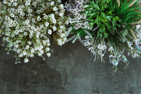 flower shop concept. close up beautiful fresh bouquet of mixed flowers on black floor.