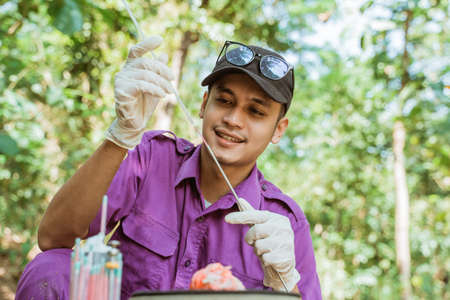 veterinarians are preparing the tools for artificial insemination of cow.の写真素材