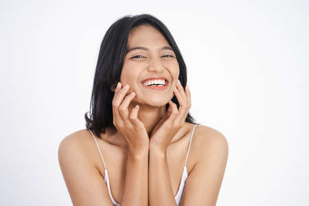 asian woman with clean fresh skin on white backgroundの写真素材