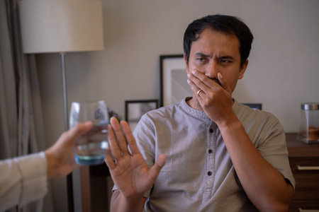 muslim man refuse the offer to drink waterの写真素材