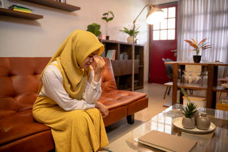 muslim woman frustrated by problem with work or relationshipの写真素材