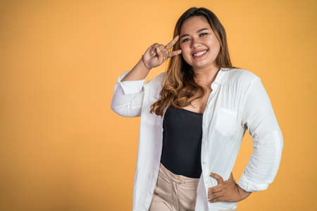 confident young asian woman portrait smiling to cameraの写真素材