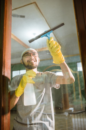 muslim young male cleaning the mosque before praying