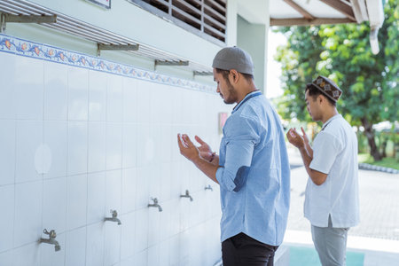 Man muslim perform ablution or wudu at the mosque