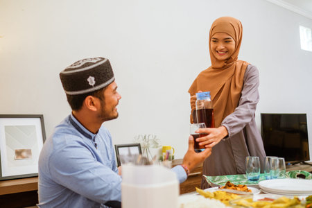 serving food for friend for iftar dinner or eid mubarak