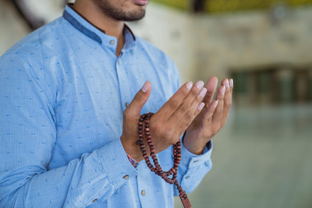 Man muslim doing prayer in the mosque